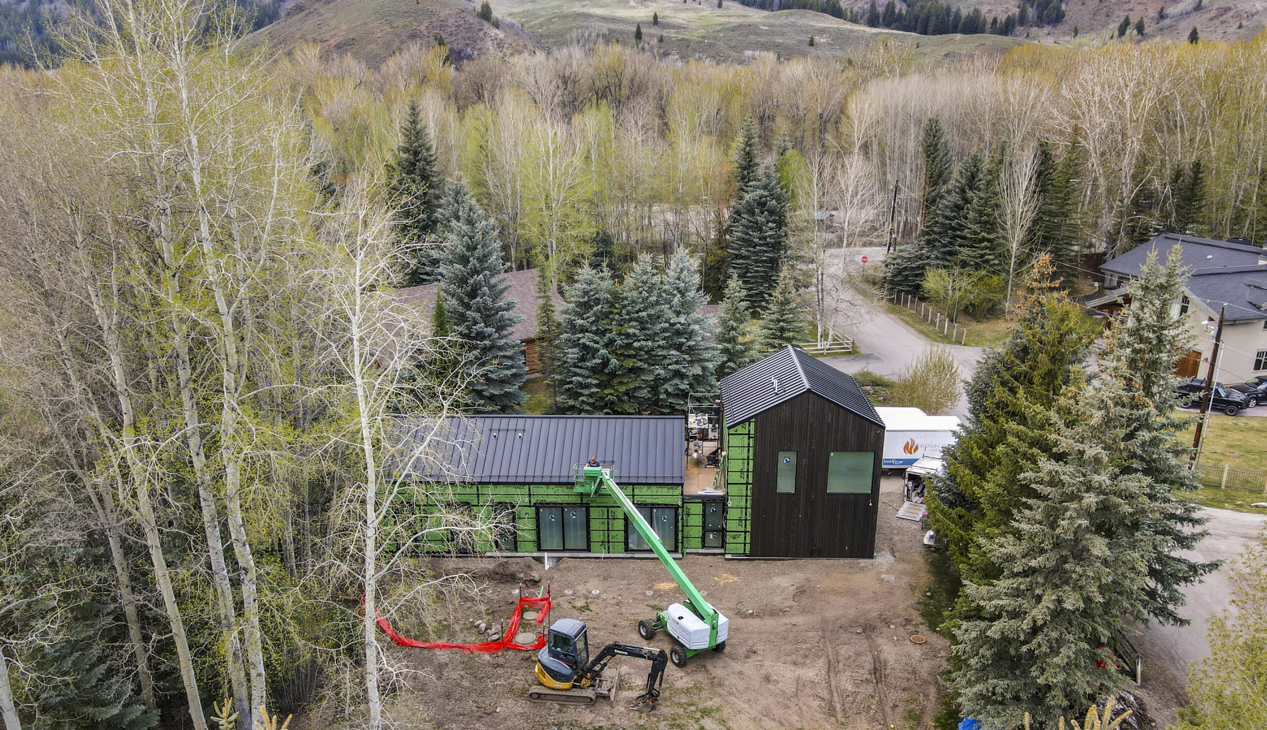 aerial shot of custom home construction project in sun valley idaho, value engineering