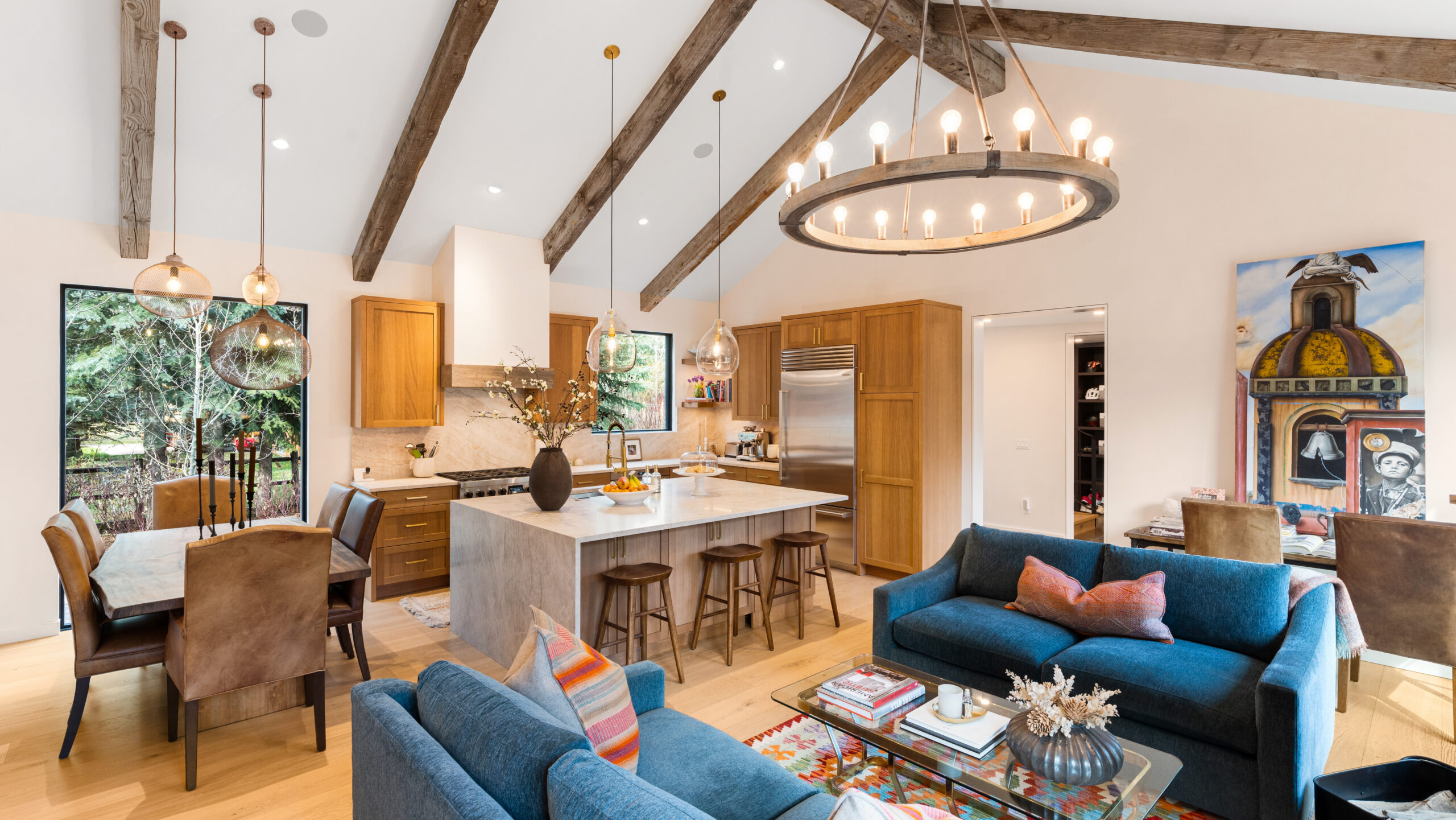 custom home sun valley living room and kitchen with wood beams