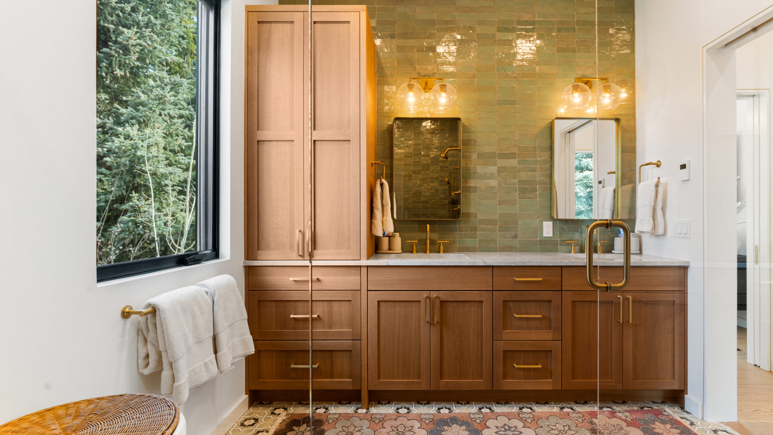 custom home sun valley bathroom with green tile and warm wood